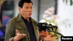 FILE - Philippine President Rodrigo Duterte speaks during a visit in Baguio city, Philippines, March 11, 2017. 