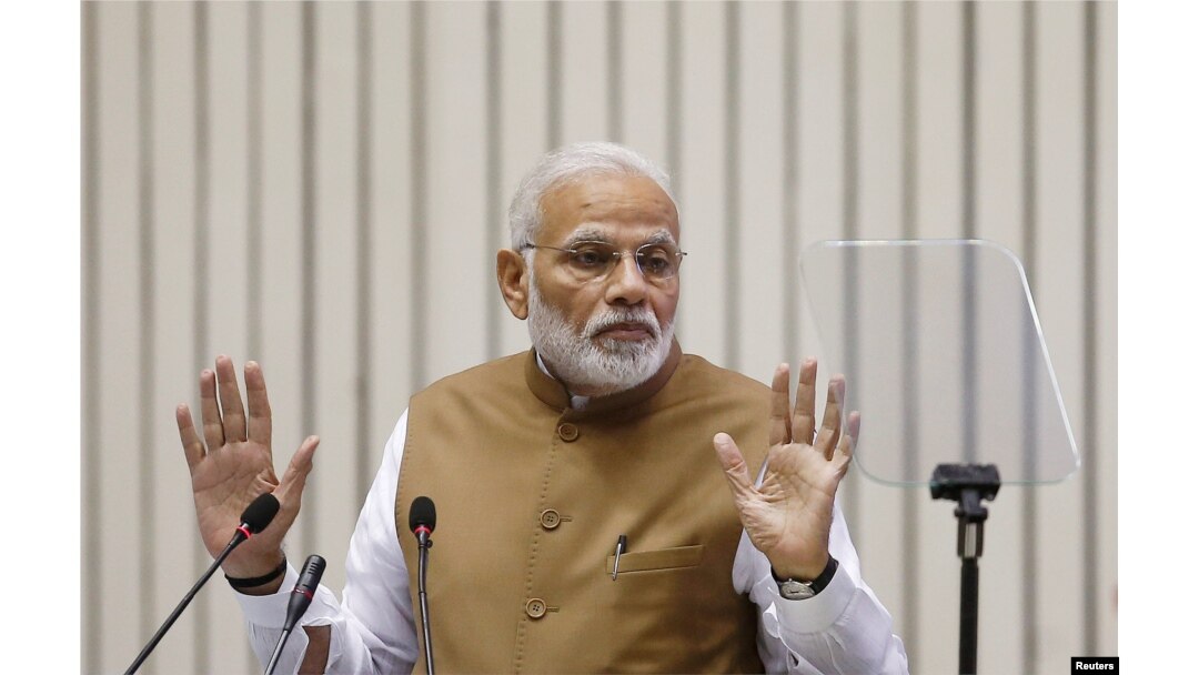 FILE - India's Prime Minister Narendra Modi gestures as he addresses a gathering in New Delhi, India, Sept. 7, 2018.