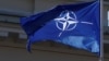 NATO flag flutters during the celebration of the 15th anniversary of Lithuania's membership in NATO in Vilnius, Lithuania, March 30, 2019.