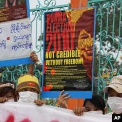 Protesters say elections held by military regime are unfair, outside a public park in Mae Sot, Thailand, 07 Nov 2010