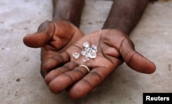 FILE - Diamonds mined from Zimbabwe