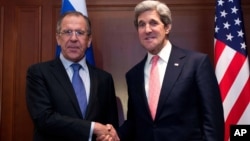 U.S. Secretary of State John Kerry, right, meets with Russian Foreign Minister Sergey Lavrov in Berlin, Feb. 26, 2013.