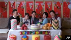 In a scene from filmmaker Andrew Ahn’s short film Dol (First Birthday), a Korean-American family gathers amid traditional dol decorations.