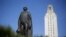 FILE - In this Nov. 29, 2012 file photo, a statue of George Washington stands near the University of Texas Tower at the center of campus, in Austin, Texas.The campus dominates most of downtown.