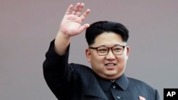 FILE - North Korean leader Kim Jong Un waves at parade participants at the Kim Il Sung Square in Pyongyang, North Korea. 