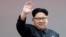 FILE - North Korean leader Kim Jong Un waves at parade participants at the Kim Il Sung Square in Pyongyang, North Korea. 