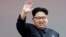 FILE - North Korean leader Kim Jong Un waves at parade participants at the Kim Il Sung Square in Pyongyang, North Korea. 