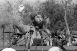 Exiled Afghan warlord Gulbuddin Hekmatyar addresses a crowd of Afghan mujahideen who gathered on January 17, 1987, in Peshawar, Pakistan. (AFP)