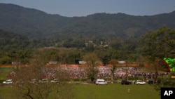 FILE - Supporters of Indian Prime Minister Narendra Modi attend an election campaign rally of ruling Bharatiya Janata Party (BJP) in Along, Arunachal Pradesh, India. 