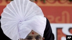 Gujarat Chief Minister Narendra Modi greets people during the first day of his fast in Ahmadabad, India, Sept. 17, 2011.