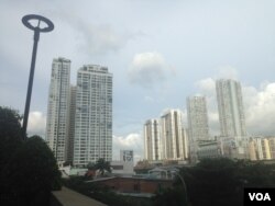 FILE - Property developers are building enclosed communities in Vietnam where sustainability is part of the design, from motion-detecting lights to pollution warning systems.