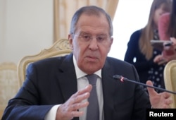 Russian Foreign Minister Sergei Lavrov attends a meeting with his Pakistani counterpart Khawaja Asif in Moscow, Russia, Feb. 20, 2018.