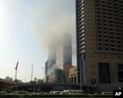 Smoke rises from a fire at a construction site near Dubai Mall in Dubai, United Arab Emirates, April 2, 2017.