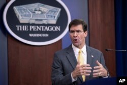 U.S. Secretary of Defense Mark Esper speaks to reporters during a briefing at the Pentagon, Aug. 28, 2019.