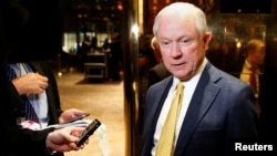 FILE - Senator Jeff Sessions (R-AL) arrives in the lobby of Republican president-elect Donald Trump's Trump Tower in New York.