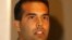 FILE - George Prescott Bush speaks during a news conference in Mexico City, Aug. 21, 2004, to try to persuade American registered voters living in Mexico to support his uncle, George W. Bush, in the presidential election. George P. Bush is now Texas land 