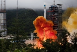A Long March-3B carrier rocket carrying the Beidou-3 satellite, the last satellite of China's Beidou Navigation Satellite System, takes off from Xichang Satellite Launch Center in Sichuan province, China, June 23, 2020.