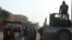 Displaced people flee during a battle with Islamic State militants in the al-Zuhoor neighborhood of Mosul, Iraq, Jan. 8, 2017. 