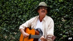 Former rebel Julian Conrado, known as "The FARC singer," sings for students before holding a talk at the National University in Bogota, Colombia, April 27, 2017.