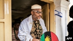 FILE: Political activist and leader of the Indigenous People of Biafra (IPOB) movement, Nnamdi Kanu, wears a Jewish prayer shawl as he leave his house in Umuahia, southeast Nigeria. Taken 5.17.2017
