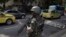 A soldier stands in guard on a street, before a meeting with Brazil's President Michel Temer and local authorities about the implementation of a decree that has placed the military in charge of Rio's state security, at the Guanabara palace in Rio de Janei