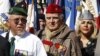 Des anciens combattants français de la guerre d'Algérie protestant contre le film Hors La Loi de Rachid Bouchareb en compétition au 63e Festival de Cannes le 21 mai 2010. (REUTERS/Eric Gaillard) 