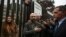 Writer Roberto Saviano (C) leaves the City of Justice in Rome, Nov. 15, 2022,following a hearing in a defamation lawsuit from Italy's current prime minister. 