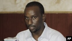 FILE - Zakariya Ismail Hersi, a former senior Al Shabab commander, speaks during a press conference at the presidential palace in Mogadishu, Somalia, Jan. 27, 2015. 