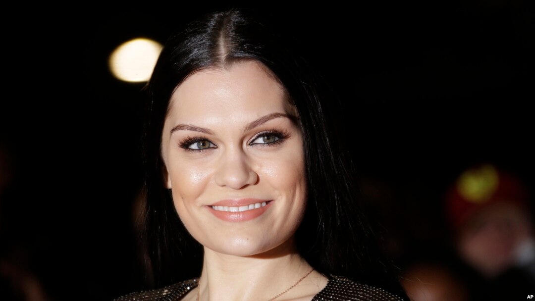 Jessie J poses for photographers upon arrival at the Mobo Awards, in central London, Oct. 22, 2014. 