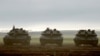 Israeli battle tanks are deployed at a position along the border with the Gaza Strip and southern Israel on January 2, 2024, amid the ongoing conflict between Israel and the militant group Hamas. 