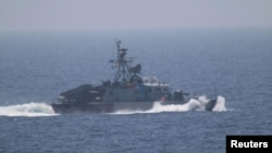 One of the five military vessels from Iran's Revolutionary Guard Corps that approached a U.S. warship hosting one of America's top generals on a day trip through the Strait of Hormuz is pictured in this July 11, 2016 handout photo. 