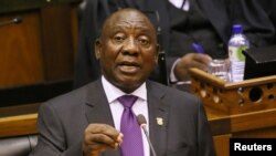 FILE - President Cyril Ramaphosa delivers his State of the Nation address at Parliament in Cape Town, South Africa, Feb. 16, 2018. 