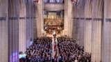 The casket of former President Jimmy Carter arrives for a state funeral at the National Cathedral, Jan. 9, 2025, in Washington. 