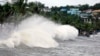 Large waves break along a seawall ahead of the expected landfall of Super Typhoon Man-yi, in Legaspi City, Albay province, Philippines, on Nov. 16, 2024.