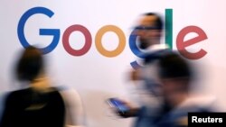 FILE - The logo of Google is pictured during the Viva Tech startup and technology summit in Paris, France, May 25, 2018. 