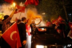 Supporters of the "Yes" vote, celebrate in Istanbul, on Sunday, April 16, 2017.