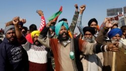 VOA Asia - India farmers protest new law