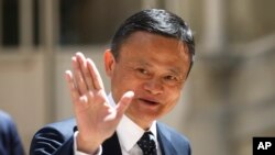 Founder of Alibaba group Jack Ma arrives for the Tech for Good summit, May 15, 2019 in Paris. 