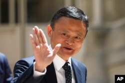 Founder of Alibaba group Jack Ma arrives for the Tech for Good summit, May 15, 2019 in Paris.