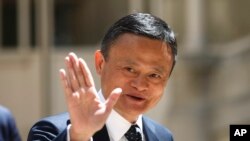 Founder of Alibaba group Jack Ma arrives for the Tech for Good summit, May 15, 2019 in Paris. 