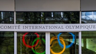 The Olympic Rings are displayed at the entrance of the IOC, International Olympic Committee headquarters during the coronavirus disease (COVID-19) outbreak in Lausanne, Switzerland, Tuesday, March 24, 2020.