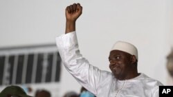 FILE - Gambian President Adama Barrow celebrates after winning the presidential election, in Banjul, Gambia, Dec. 5, 2021. 