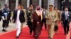 Saudi Crown Prince Mohammd bin Salmand is seen off by Prime Minister Khan, left, and Army chief, Gen. Qamar Bajwa, right, at Islamabad's Nur Khan Air Force base, Pakistan, Feb. 18, 2019.
