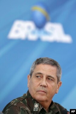 General Walter Souza Braga Netto speaks during a press conference after signing a decree for the military intervention of Rio de Janeiro's local police, Feb. 16, 2018.
