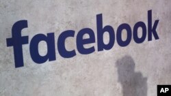 FILE - The Facebook logo is displayed in Paris, Jan. 17, 2017.