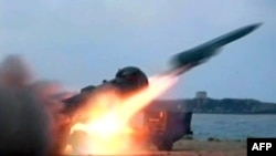 A handout picture released by the Syrian Arab News Agency on July 7, 2012, shows a missile being fired during a military excercise (AFP photo/ HO / SANA).