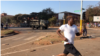 FILE: Protesters are seen running from members of the army, in Harare, Zimbabwe, Aug. 7, 2018. On Tuesday, embassies of the European Union, the U.S., Canada and Switzerland in Harare issued a statement expressing concern over “excessive use of force" by Zimbabwe.