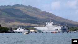 French Navy ships sit in port at Naval Base Guam, May 12, 2017. Joint Region Marianas Chief of Staff Capt. Jeff Grimes announced Friday that joint exercises involving the U.S., U.K., France and Japan at the U.S. Pacific island of Guam have been indefinitely postponed after a French landing craft ran aground. 
