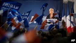 Far-right candidate for the presidential election Marine Le Pen speaks during a campaign meeting in Arcis-sur-Aube, near Troyes, France, April 11, 2017. Le Pen argues that Muslim immigration and economic globalization are destroying France's identity.