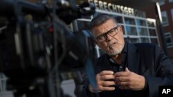 Emile Ratelband answers questions during an interview in Utrecht, Netherlands, Thursday, Nov. 8, 2018. (AP Photo/Peter Dejong)